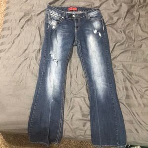Bellbottom jeans designs on back pockets size 11